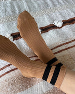 Her socks varsity - peanut